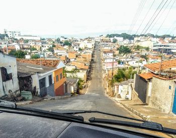 High angle view of road amidst buildings in city