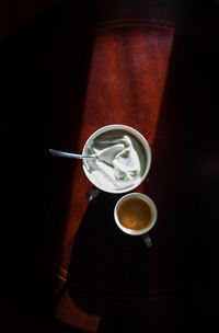 High angle view of coffee cup on table