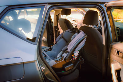 Rear view of man driving car