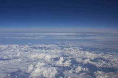 Aerial view of cloudscape against blue sky