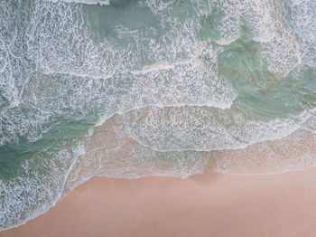 High angle view of rocks on beach