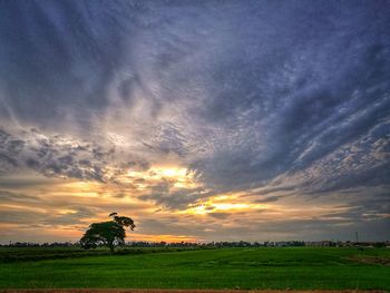 Scenic view of dramatic sky during sunset