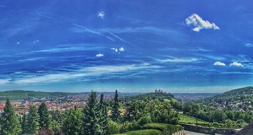 Aerial view of cityscape against sky