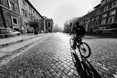 Blurred motion of man on city street