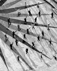 High angle view of people walking on street