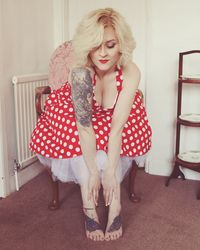 Beautiful young woman wearing red dress