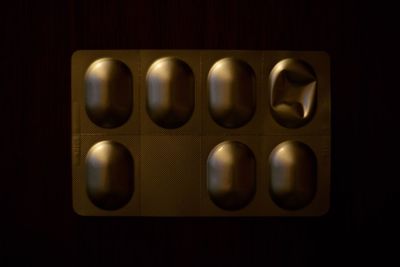 Close up of electric lamp against black background