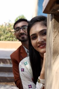 Portrait of smiling young couple