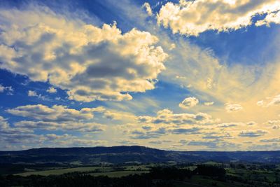 Scenic view of landscape against sky during sunset