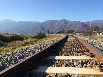 Railroad tracks against sky