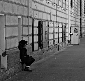 Full length of woman standing in building