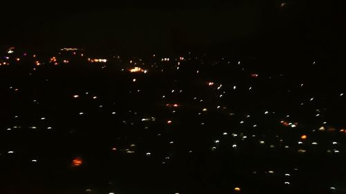 View of illuminated city at night