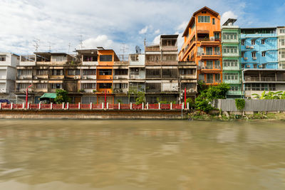 Buildings in city against sky