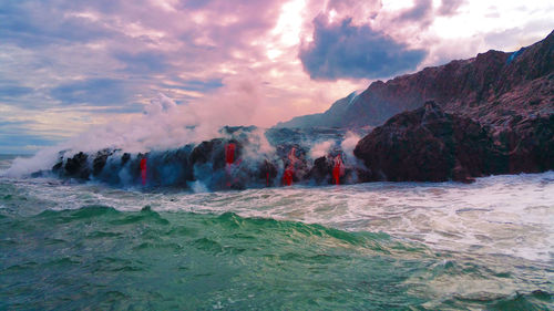 Panoramic view of shore against sky