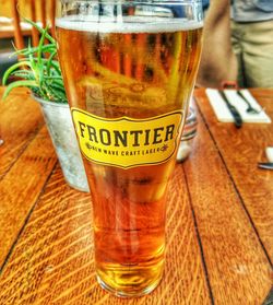 Close-up of beer glass on table