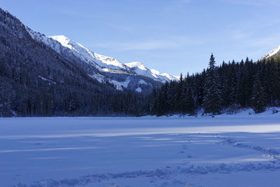 Scenic view of snowcapped mountains against sky