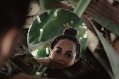 High angle portrait of young woman outdoors