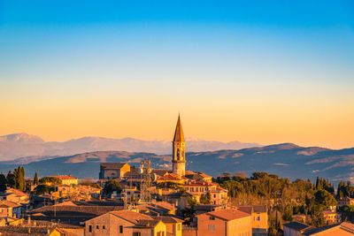 View of cityscape against sky during sunset