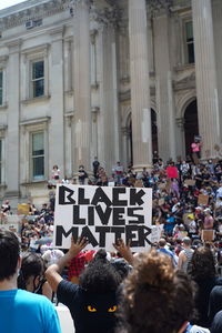 Group of people in front of building