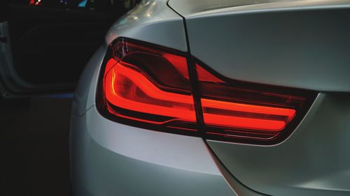 Illuminated tail light of car at night