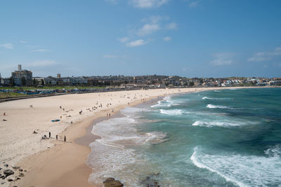 View of beach against cloudy sky