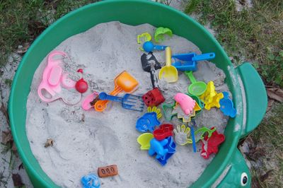 High angle view of multi colored toy on grass