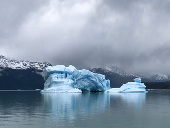 Scenic view of glacier against sky