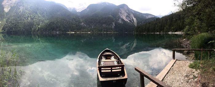 Scenic view of lake by mountains