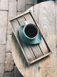 Close-up of coffee on wooden table