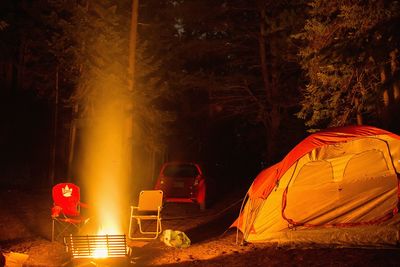 Illuminated tent at night