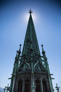 Low angle view of building against blue sky