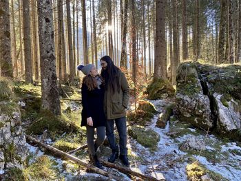 In love couple looking to each other in a germany based forest. 