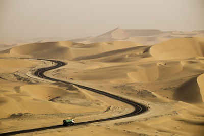 Scenic view of desert against sky