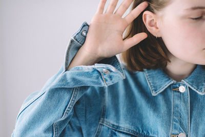 Close-up portrait of woman looking down