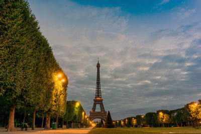 Low angle view of eiffel tower against sky at dusk