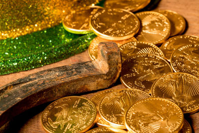 Close-up of coins on table