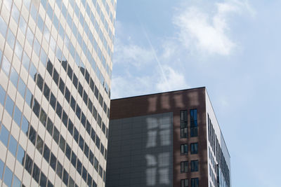 Low angle view of modern building against sky
