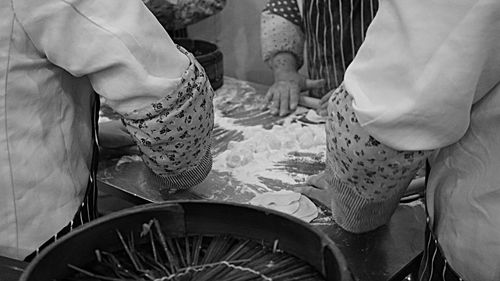 Low section of people sitting outdoors