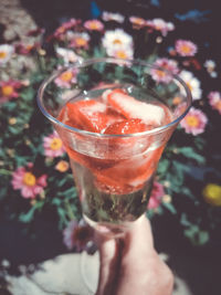 Close-up of hand holding ice cream