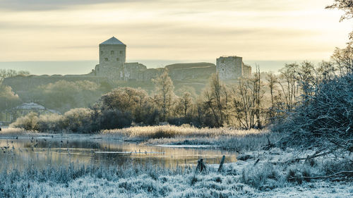 The 700 years old fortress of bohus in the morning light on a frosty winter morning in sweden.