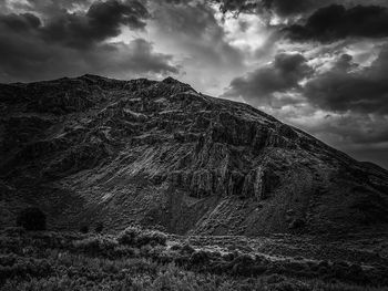 Low angle view of mountain range against sky