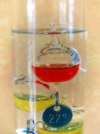 Close-up of drink in glass jar on table