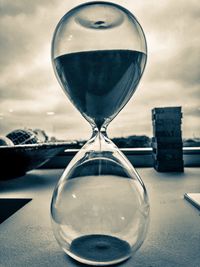 Close-up of clock on table