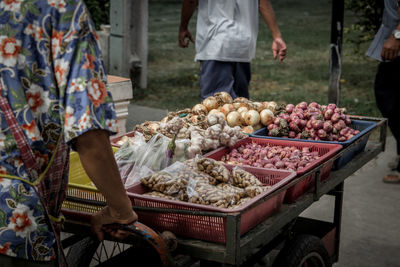 People at market stall