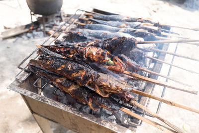 Close-up of meat on barbecue grill