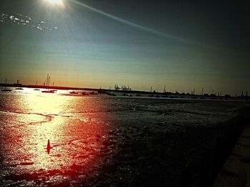 Scenic view of sea against sky at sunset