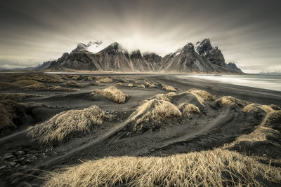 Scenic view of snowcapped mountains against sky