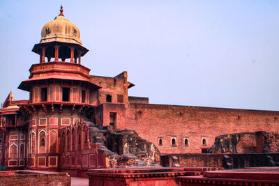 Low angle view of historic building against clear sky