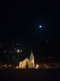 View of church lit up at night