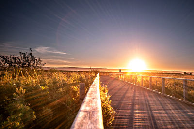 Scenic view of landscape against sky during sunset
